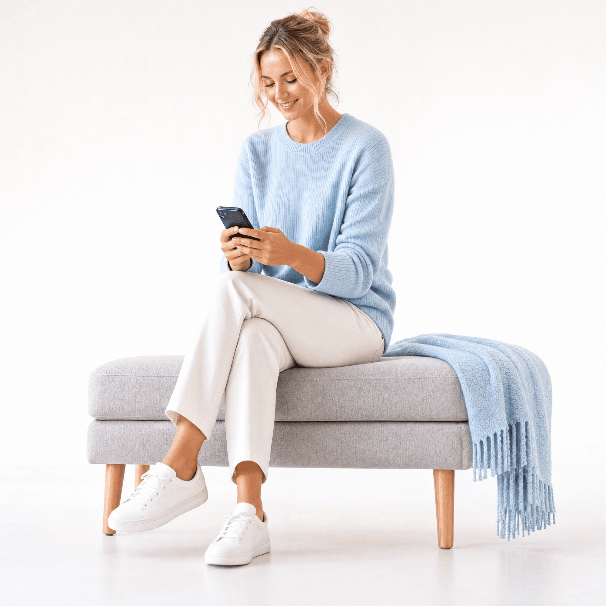 Homebuyer reviewing options on her phone
